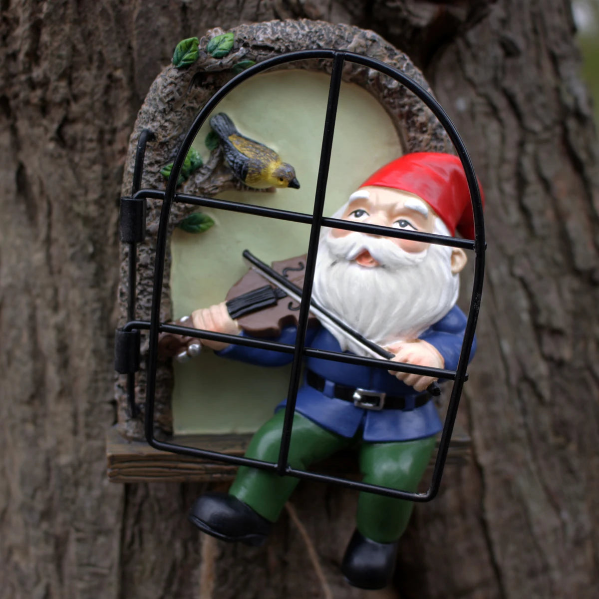 Outdoor 1 resin handicraft hanging from a dwarf playing piano tree, iron window, hanging tree, decorating courtyard tree trunks, hanging