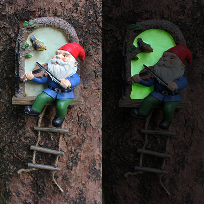 Outdoor 1 resin handicraft hanging from a dwarf playing piano tree, iron window, hanging tree, decorating courtyard tree trunks, hanging